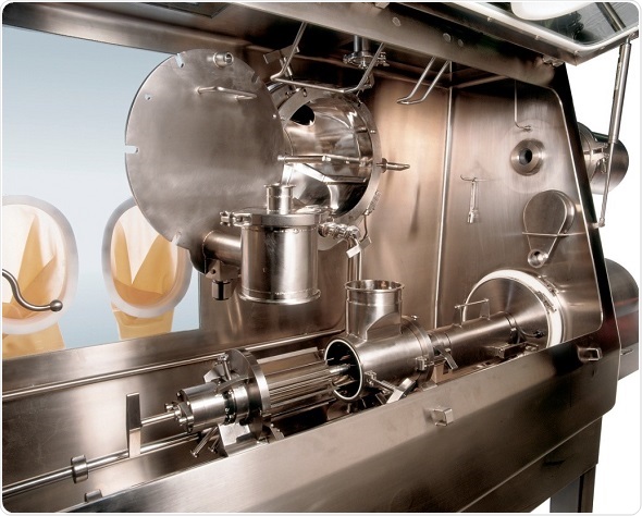 The HAPI material is fed from the dryer through hygienic rotary valves at a controlled rate into the pharmaceutical hammer mill.