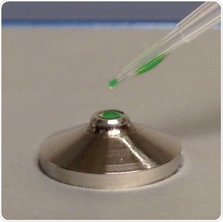 Example of liquid sample adhering to the side of a pipette tip resulting in a mis-loaded aliquot. Green coloring was added to the sample to enhance visibility for demonstration purposes.