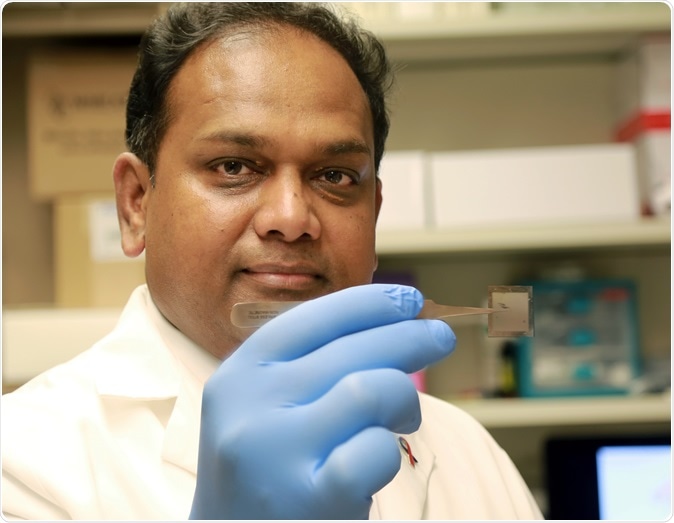Chandan Sen, PhD, holds a chip that could revolutionize medical care. In laboratory tests on mice at The Ohio State University Wexner Medical Center, the chip was able to heal serious wounds with a single touch by converting skin cells into vascular cells.