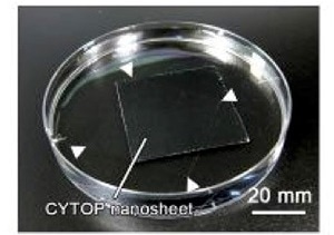 A 133-nm thick CYTOP nanosheet, floating on water, used for wrapping biological tissue for improved microscopy imaging.