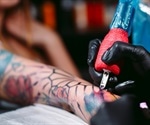 Study confirms tattoo nanoparticles migrate around the body