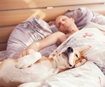 Your dog in your bed with you – is it good for your sleep?