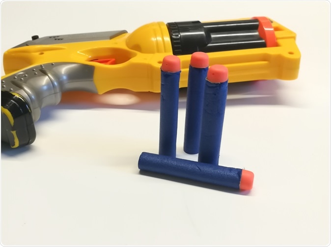 Foam bullet and gun toy. Image Credit: ukmng / Shutterstock