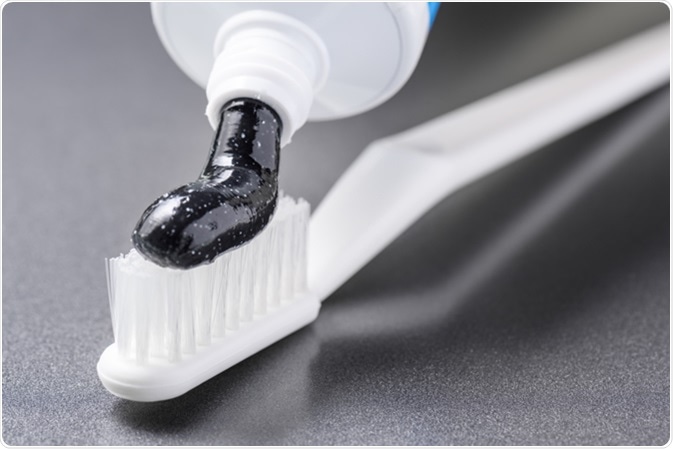 Close-up view of black charcoal toothpaste. Image Credit: Efired / Shutterstock