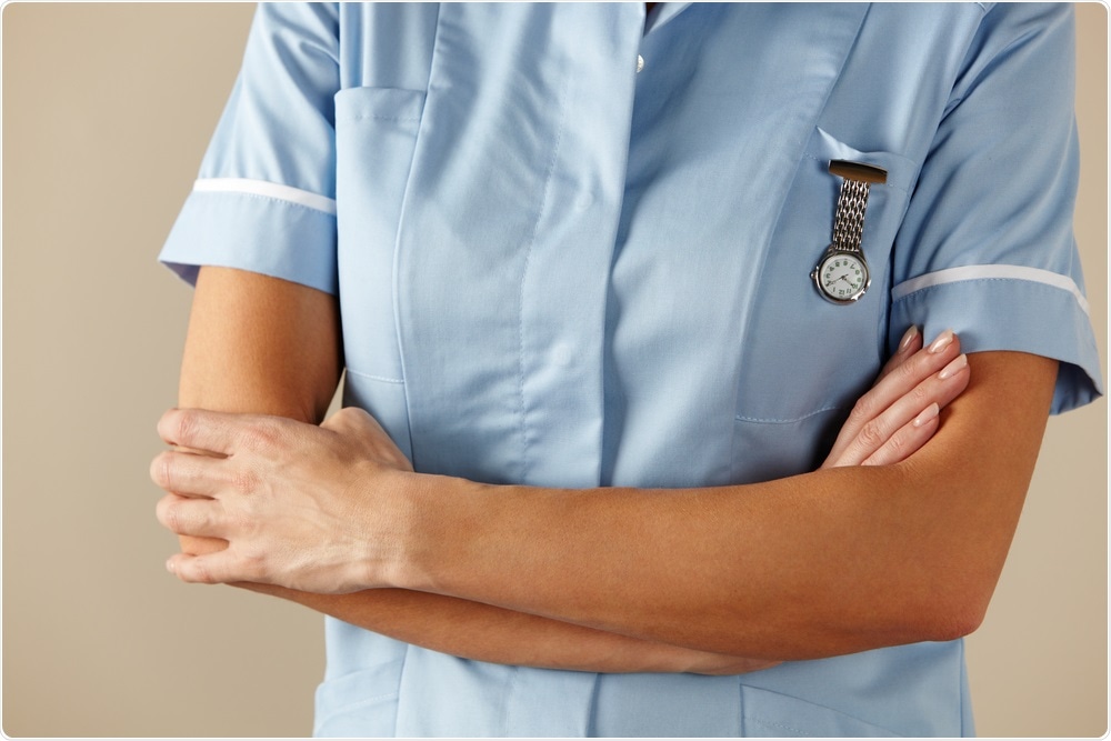 NHS Nurse folding arms