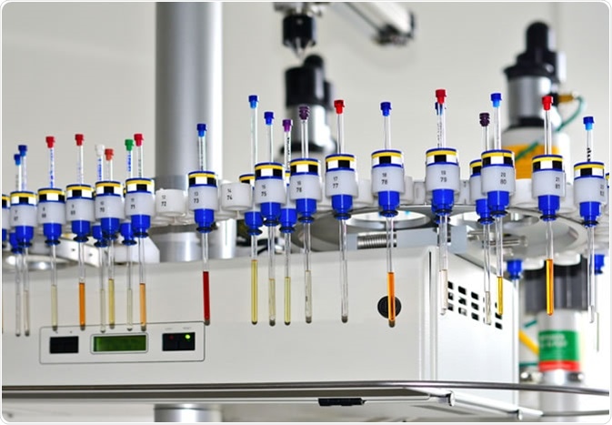 Autosampler of NMR spectrometer loaded with samples for analysis. Image Credit: Smereka / Shutterstock