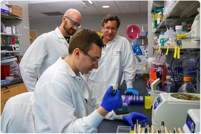 Mathew Gardner, PhD, and Christoph H. Fellinger, PhD, worked closely with mentor Michael Farzan, PhD, co-chairman of the Scripps Research Department of Immunology and Microbiology, on the study. Image Credit: Scott Wiseman for Scripps Research
