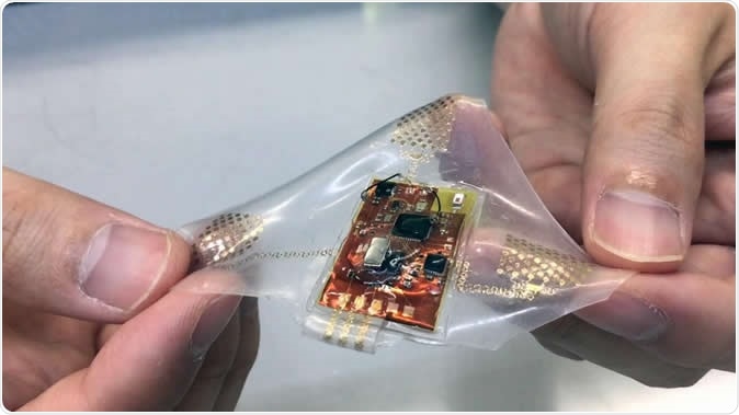 A wireless, wearable monitor built with stretchable electronics could allow comfortable, long-term health monitoring of adults, babies and children. Image Credit: John Toon, Georgia Tech