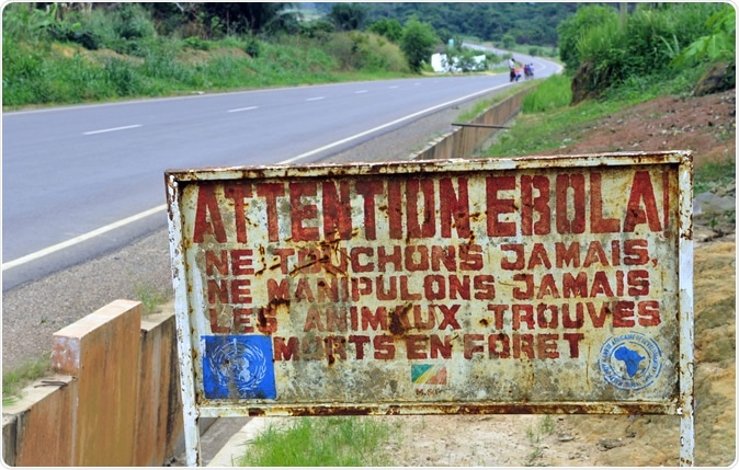 MAKOUA, CONGO, AFRICA - A sign warns visitors that area is a Ebola infected. Image Credit: Sergey Uryadnikov / Shutterstock