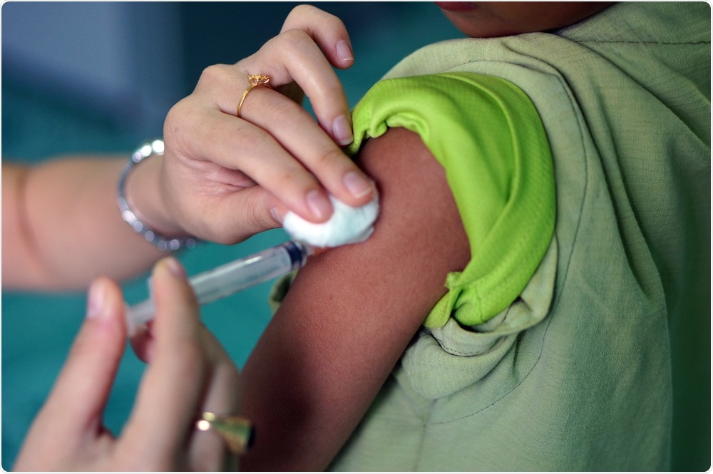 Child receiving measles vaccination