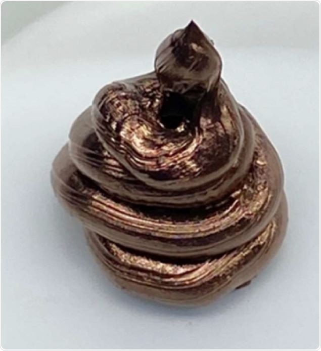 aCu after being dispensed from a tube. The dense thixotropic copper gel is paste-like and stable. It behaves like a typical non-Newtonian “liquid”. A layer of amine surfactants exerts strong cohesion via hydrophobic interactions and organic end-chain entanglement.
