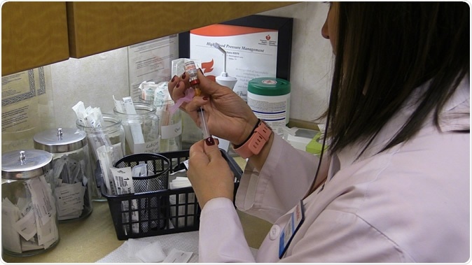 Nurse preparing to administer shingles vaccine. Image Credit: American Heart Association