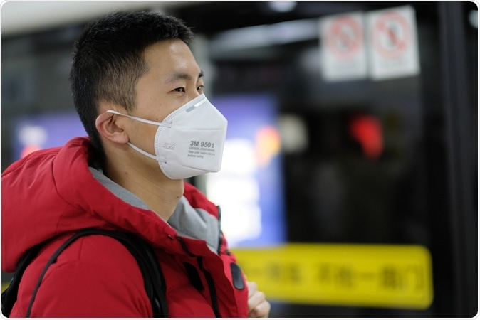 Shanghai/China-Jan 2020: Man wearing face mask for protection against coronavirus COVID-19. Image Credit: Robert Wei / Shutterstock