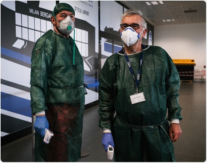 ITALY, BERGAMO- 22 February 2020: medical services at the airport Bergamo-Milano investigate aircraft passengers who have arrived in Italy to minimize the risk of the spread of the coronavirus epidemic. Image Credit: Grabowski Foto / Shutterstock