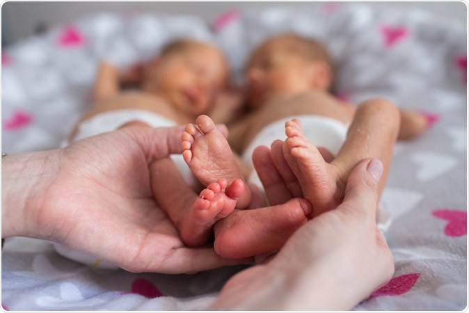 What is the association of gestational age at the time of birth of twins with the risk of perinatal mortality and special educational need and what is the optimal week for the birth? Image Credit: Kristina Bessolova / Shutterstock