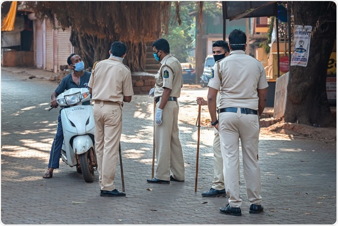 03/28/2020 India, GOA, Arambol, Police (CRPF) personnel stops and controled commuters during Indian lockdown and curfew as preventive measure against COVID-19 coronavirus. Image Credit: leshiy985 / Shutterstock