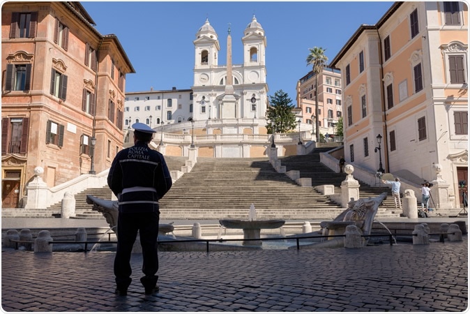 ROME, ITALY - 12 March 2020: A Police stands alone in front of the Spanish Steps in Rome, Italy. Confinement measures are enforced following the coronavirus pandemic emergency. Image Credit: Em Campos / Shutterstock