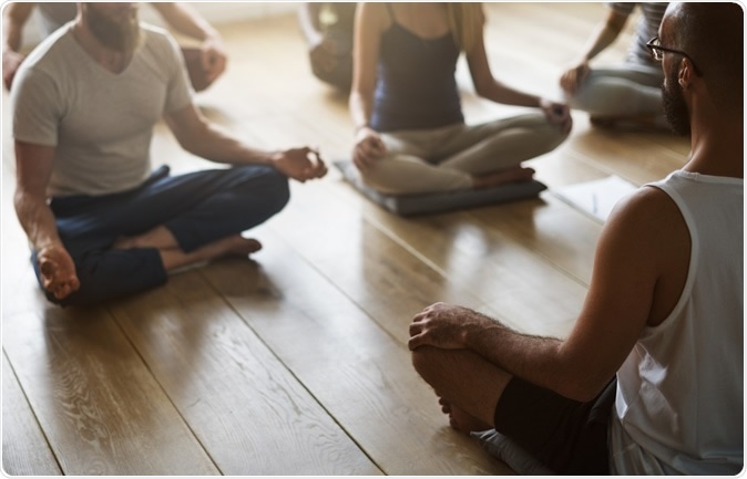 Study: Effects of yoga on depressive symptoms in people with mental disorders: a systematic review and meta-analysis. Image Credit: Rawpixel.com / Shutterstock
