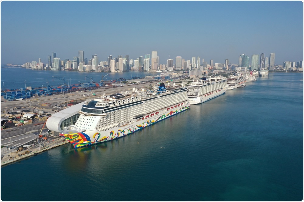 Miami, Florida - April 18, 2020 - Aerial view of cruise ships at Port Miami cruise terminal during covid-19 pandemic. Image Credit: Francisco Blanco / Shutterstock