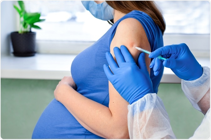 Pregnant Woman getting a Vaccine