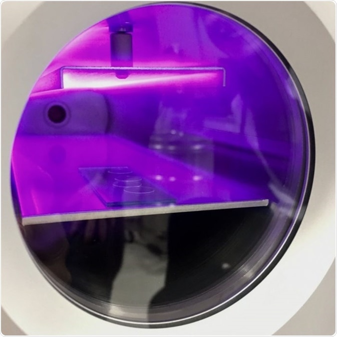 Plasma cleaning coverslips using HPT-100. Master’s student Nina Kantor-Malujdy seen in the reflection.