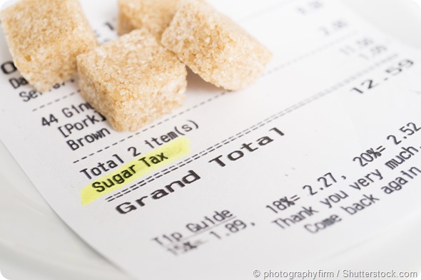 A restaurant receipt showing a sugar tax being charged