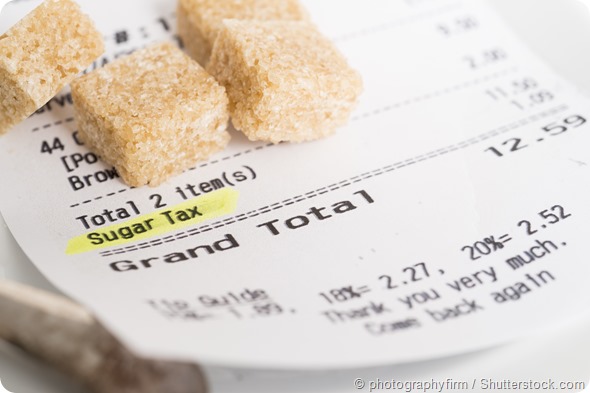 A restaurant receipt showing a sugar tax being charged