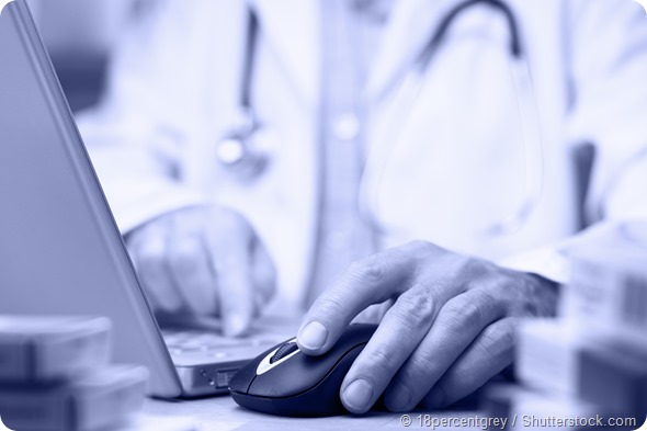 Doctor preparing online internet medical record blue tone