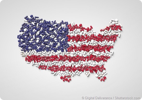 Map and flag of USA made out of pills on white background