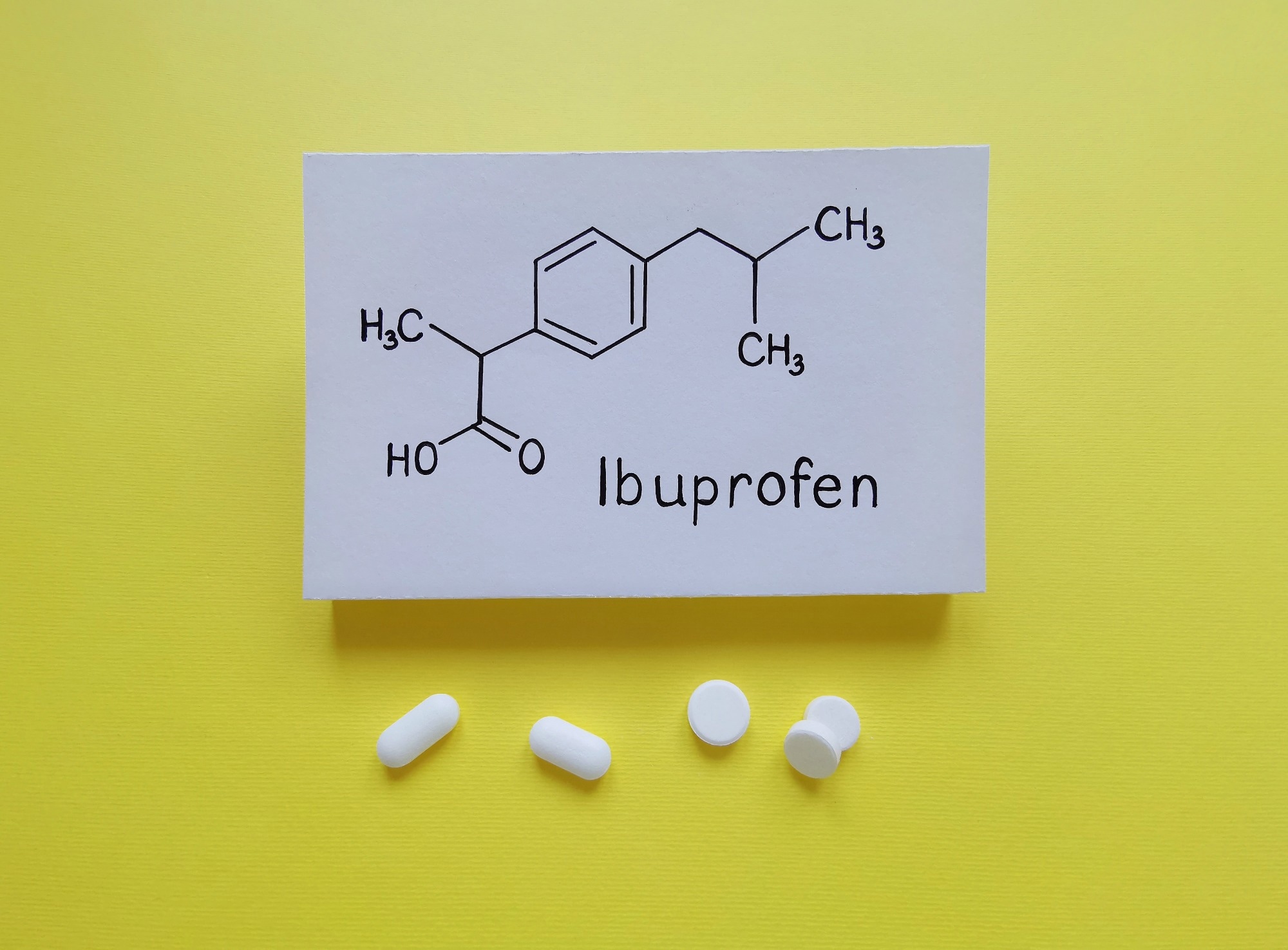 Ibuprofen is a medication in the nonsteroidal anti-inflammatory drug (NSAID) class that is used for treating pain and fever. Image Credit: Danijela Maksimovic / Shutterstock