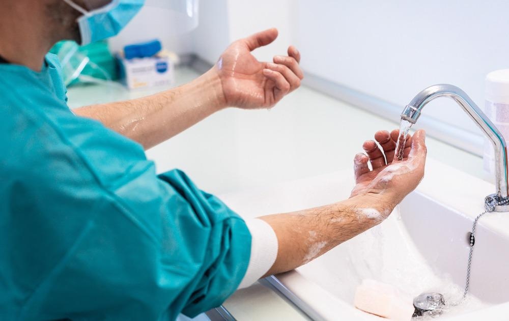 Healthcare worker washing hands