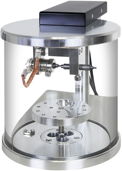 Sample chamber with Ø63mm height adjustable stage.