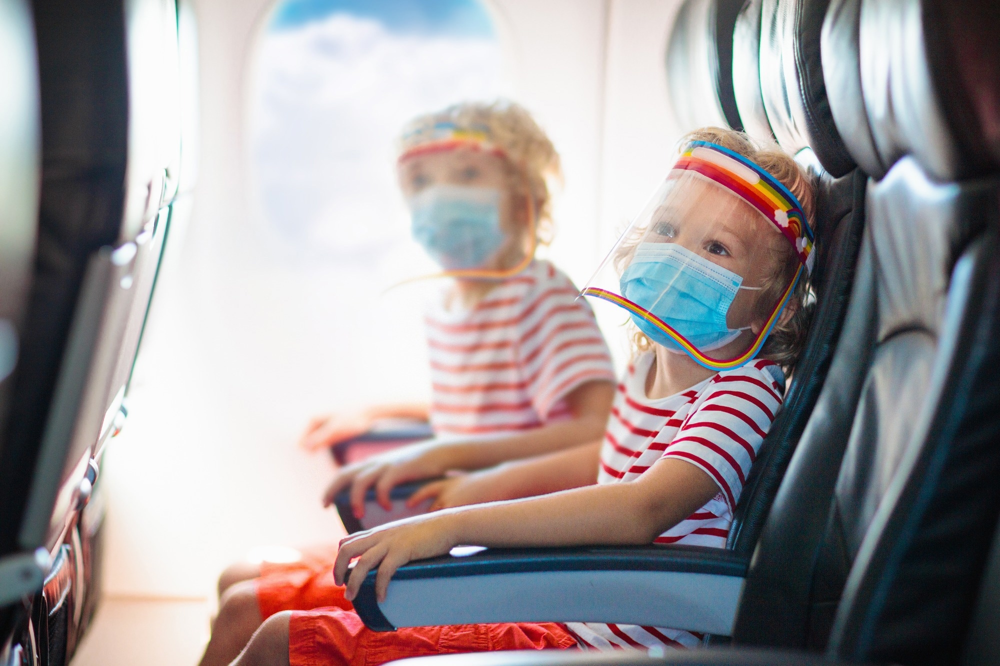 Study: Evaluating vacant middle seats and masks as Coronovirus exposure reduction strategies in aircraft cabins using particle tracer experiments and computational fluid dynamics simulations. Image Credit: FamVeld / Shutterstock