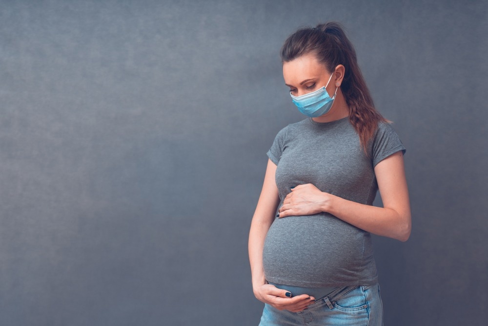 Study: Pregnancy outcomes and vaccine effectiveness during the period of omicron as the variant of concern, INTERCOVID-2022: a multinational, observational study. Image Credit: Velishchuk Yevhen/Shutterstock