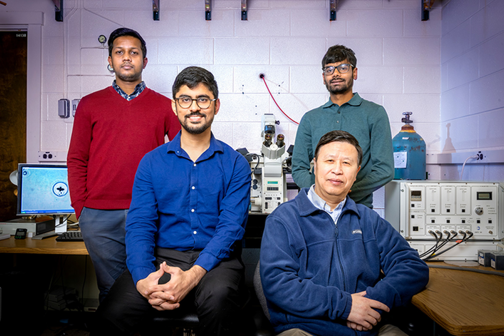 Professor Ning Wang, front right, is joined by researchers from left, Fazlur Rashid, Kshitij Amar, and Parth Bhala. Image Credit: Fred Zwicky