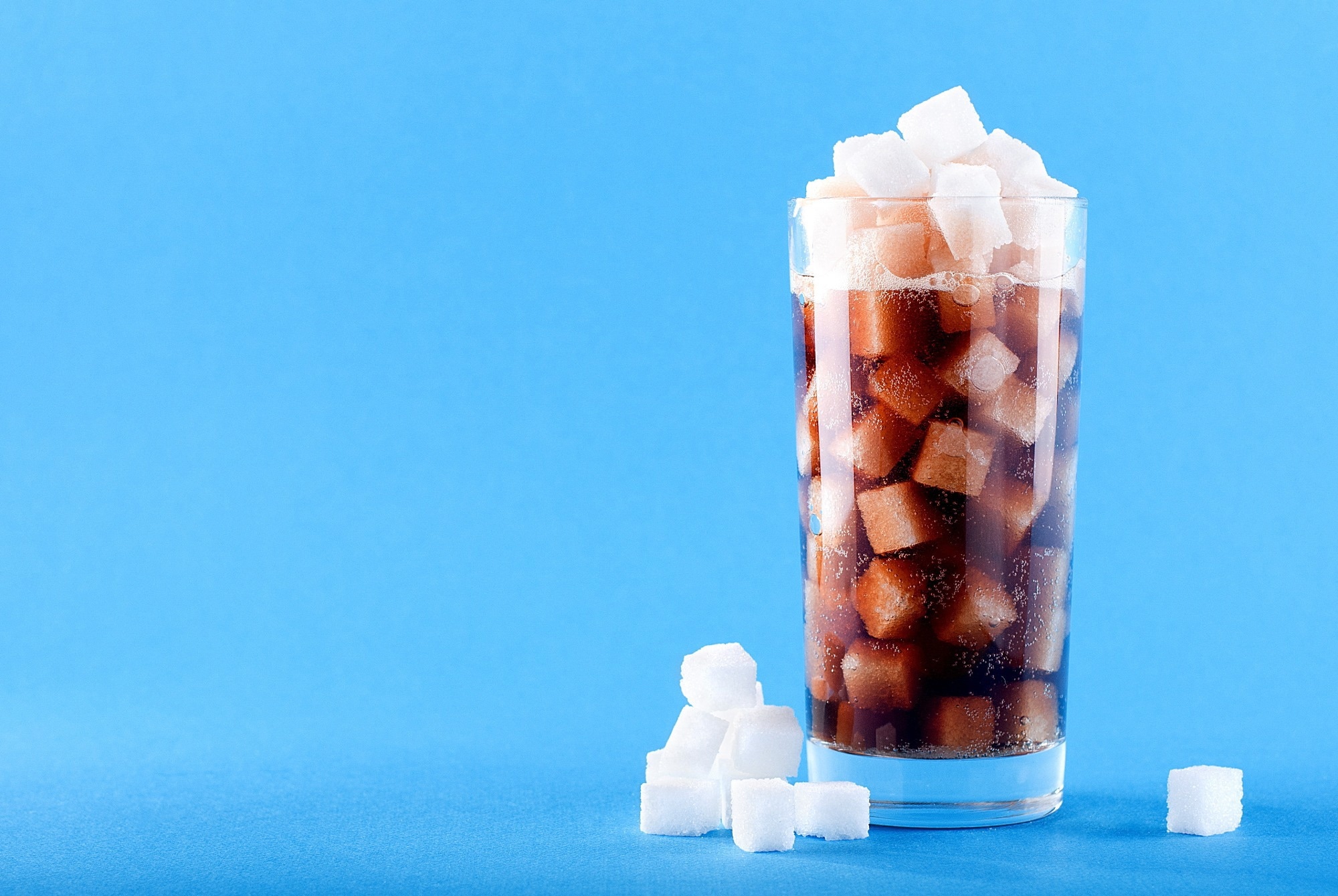 Original Research Article: Sugar-sweetened beverage consumption and weight gain in children and adults: a systematic review and meta-analysis of prospective cohort studies and randomized controlled trials. Image Credit: Valerii__Dex / Shutterstock