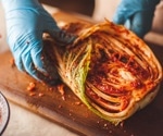 What are the effects of kimchi on human health?