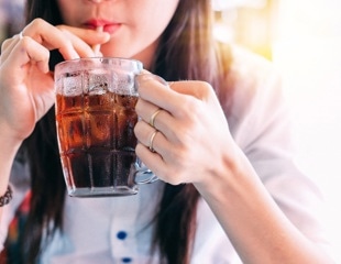 What is the association between soft drink consumption and prevalence of overweight and obesity in adolescents?