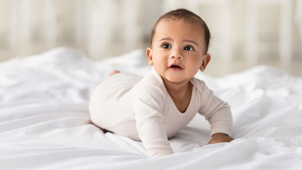 Study: Visual objects approaching the body modulate subsequent somatosensory processing at 4 months of age. Image Credit: Prostock-studio/Shutterstock.com