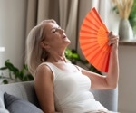 How can food influence the severity of menopausal hot flashes?