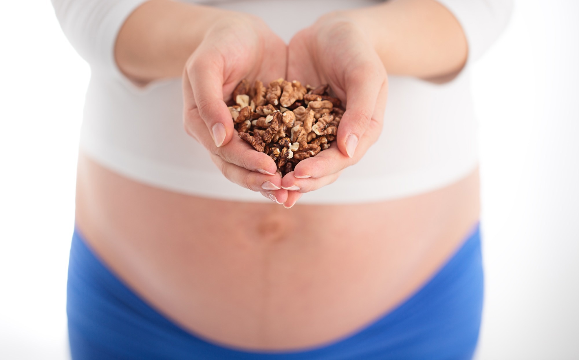 Study: Nut consumption during pregnancy is associated with decreased risk of peer problems in 5-year-old Japanese children. Image Credit: Valentin Valkov / Shutterstock